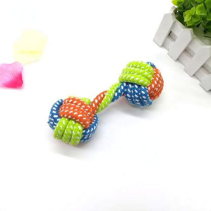 Dog bites cotton rope toy